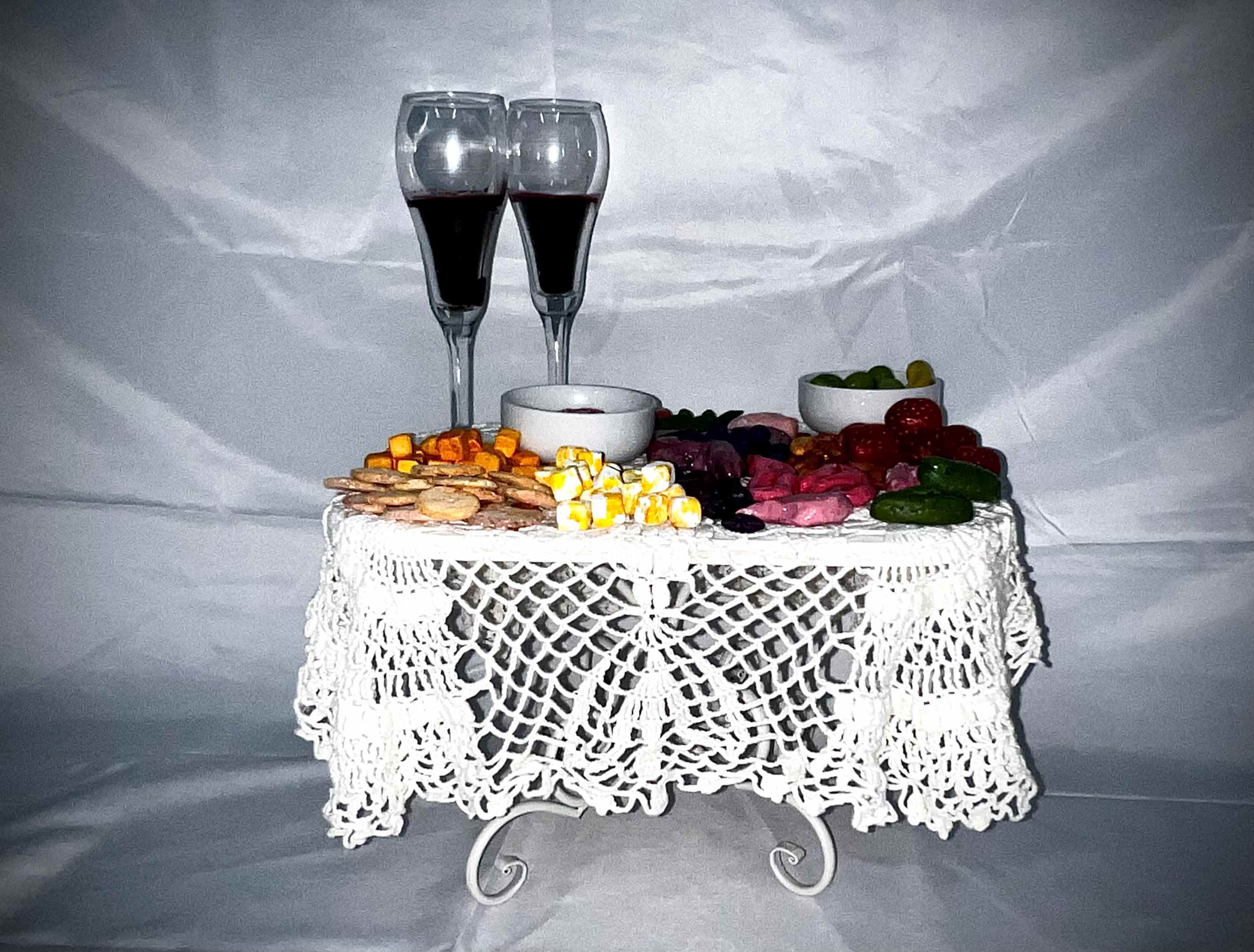 Decorative board with clay food and organs on top. 