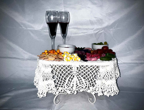 Decorative board with clay food and organs on top. 